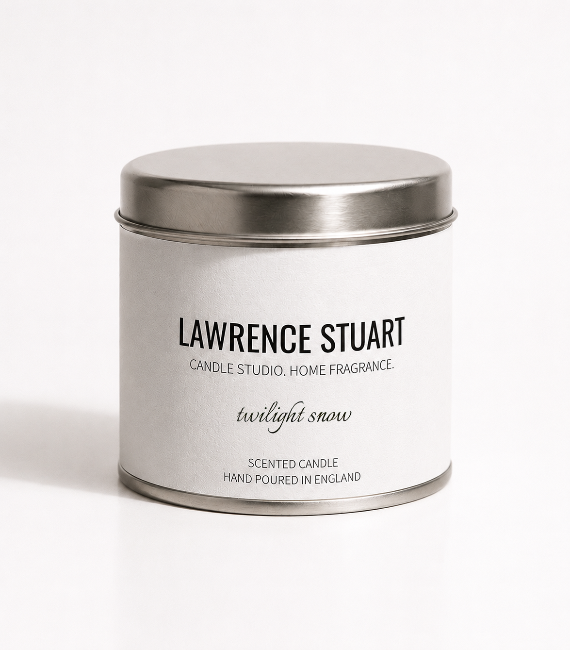 Lawrence Stuart Twilight Snow candle tin on a white background.
